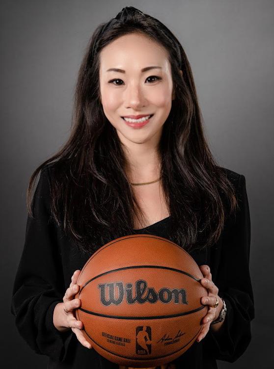 Jen Choi '08 posing with a basketball.