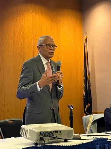 Speaker at a conference in Albany RESIZED