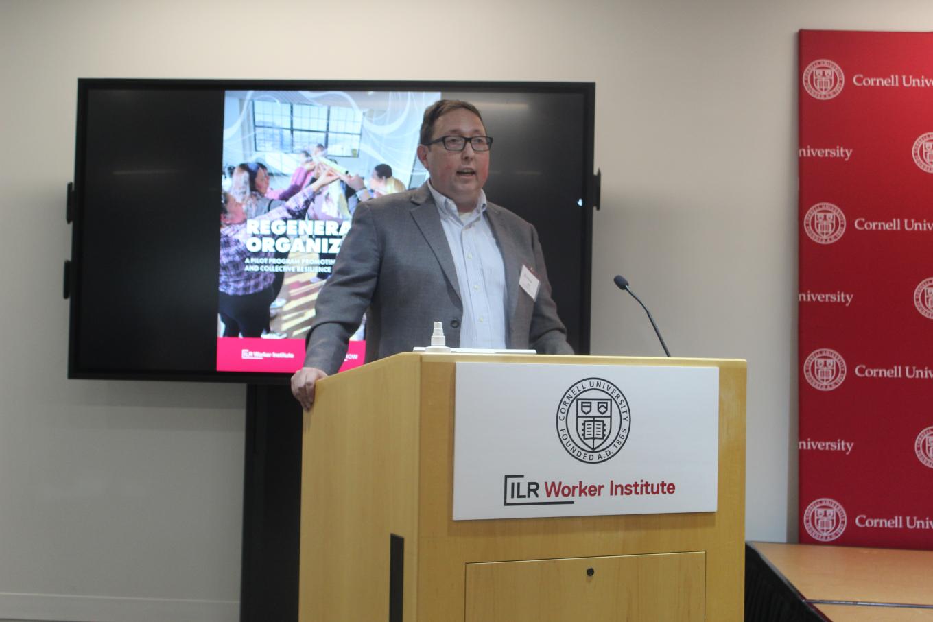 Dean Ariel Avgar giving speech to group