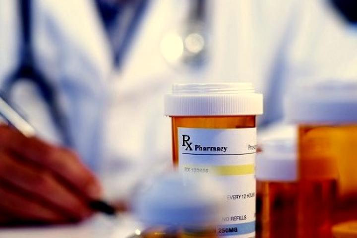 Opioid Bottle and Doctor Prescribing